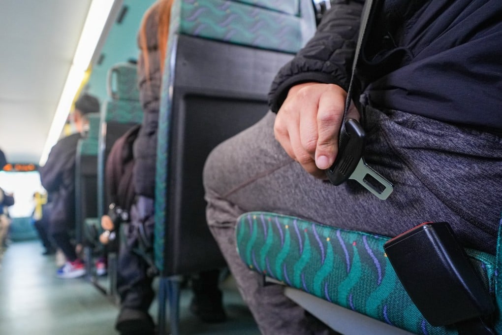 A new law taking effect on Sunday mandates that passengers must wear seat belts on buses. Photo: Eugene Lee