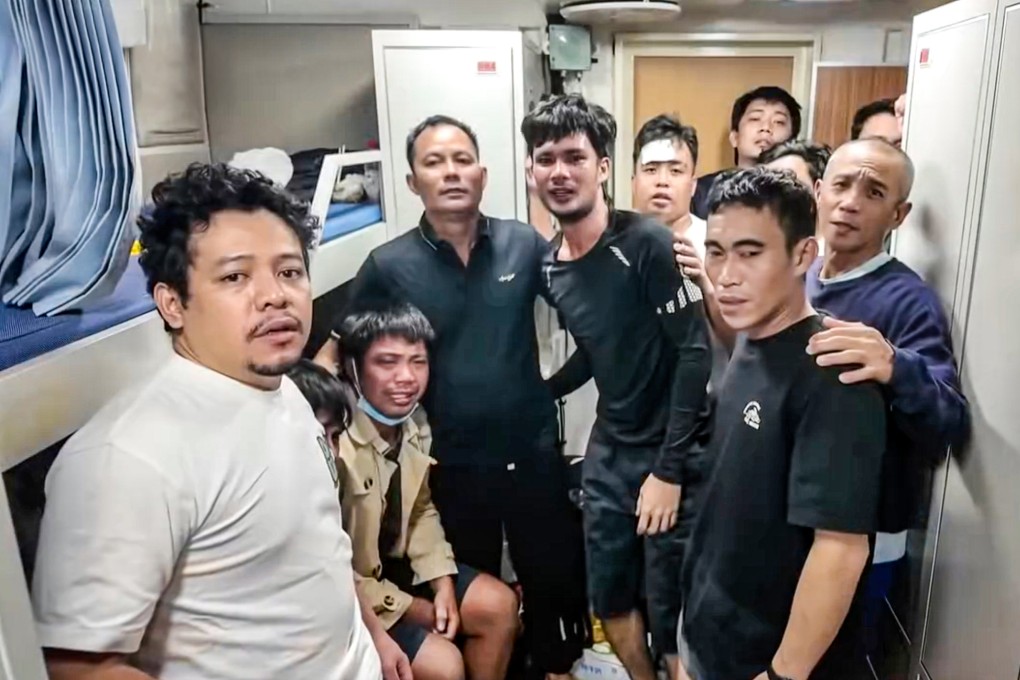 Surviving crew members of the capsized Devon Bay cargo ship reunite after their rescue by the China Coast Guard near Scarborough Shoal on Friday. Photo: Handout