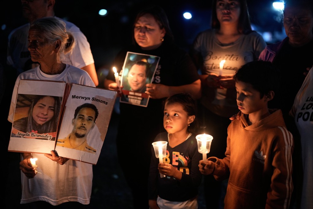Relatives hold a vigil calling for the release of their loved ones outside the Rodeo I prison in Guatire, Venezuela on Friday. On Sunday, a Venezuelan rights group ‍said 80 people considered political prisoners had been released. Photo: AP