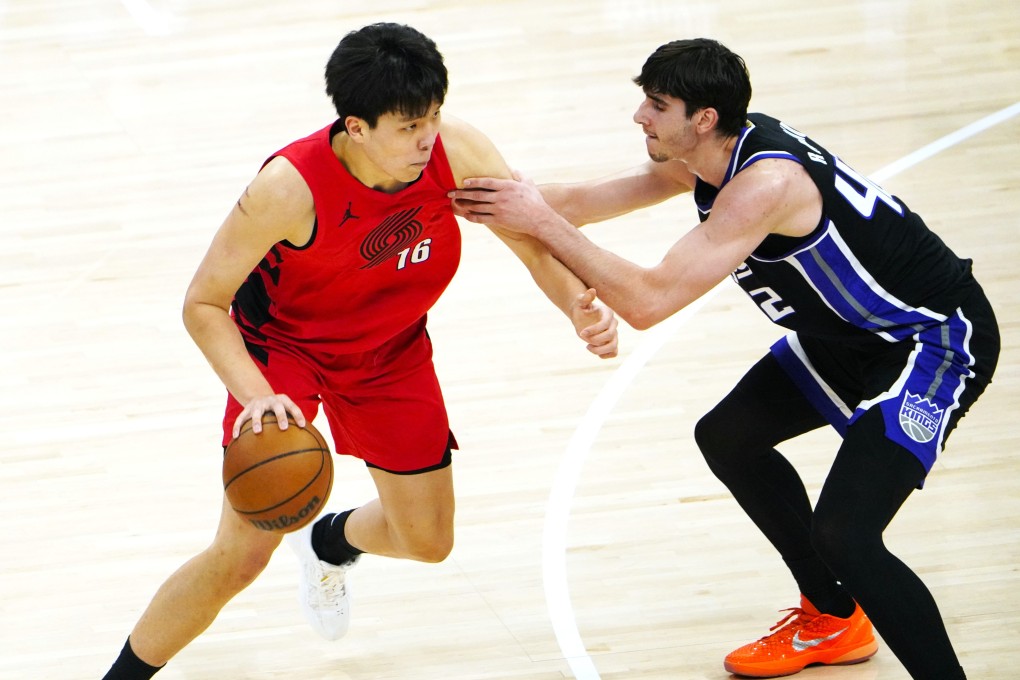 Yang Hansen (left) was a No 16 pick by the Portland Trail Blazers last summer. Photo: Xinhua