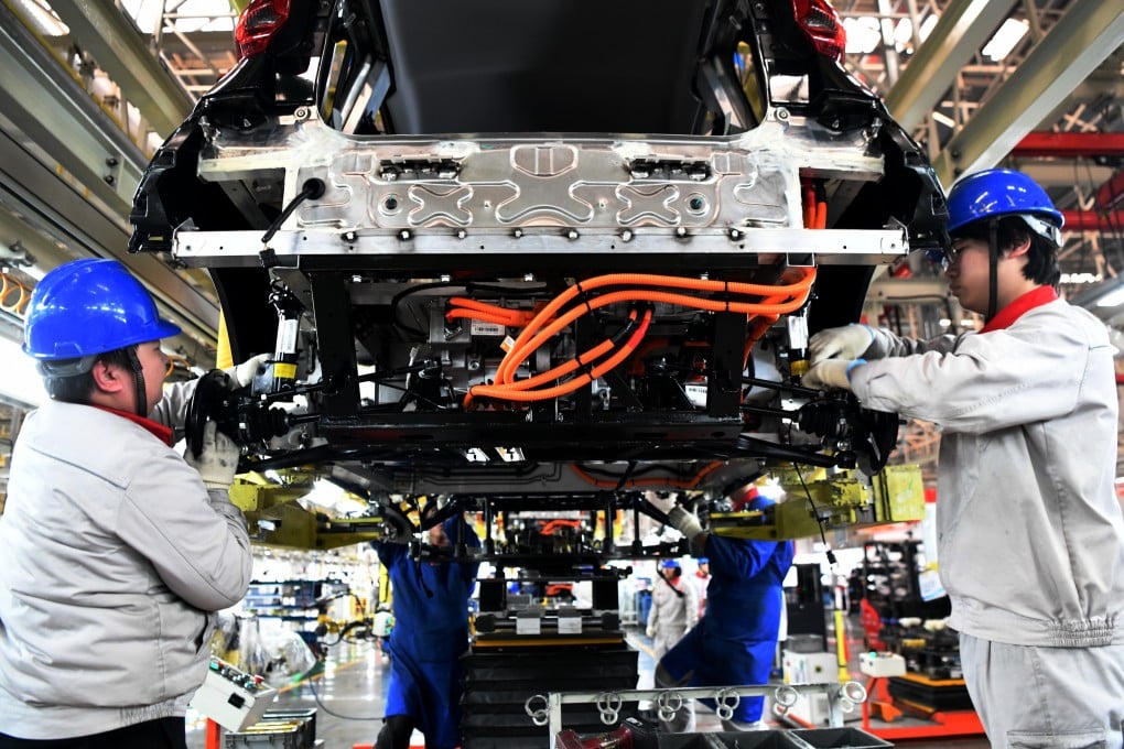 Workers assemble electric vehicles in Shijiazhuang, Hebei province, on December 24, 2025. Photo: VCG via Getty Images