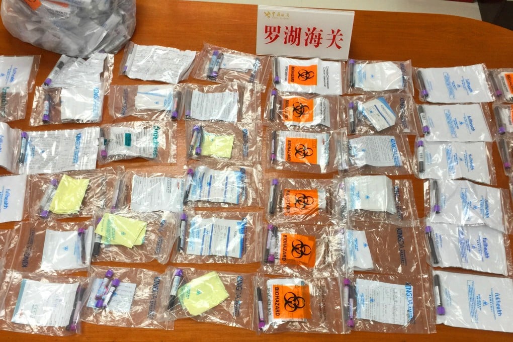 Customs officials at Shenzhen’s Luohu Port seized 142 blood samples that were found in the school bag of a 12-year-old girl crossing into Hong Kong on February 23, 2019. Photo: Handout from Luohu Port
