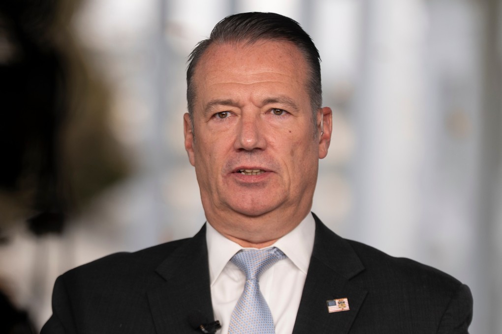 Todd Lyons, acting director of ICE is interviewed on TV on the White House grounds in November 2025. Photo: AP