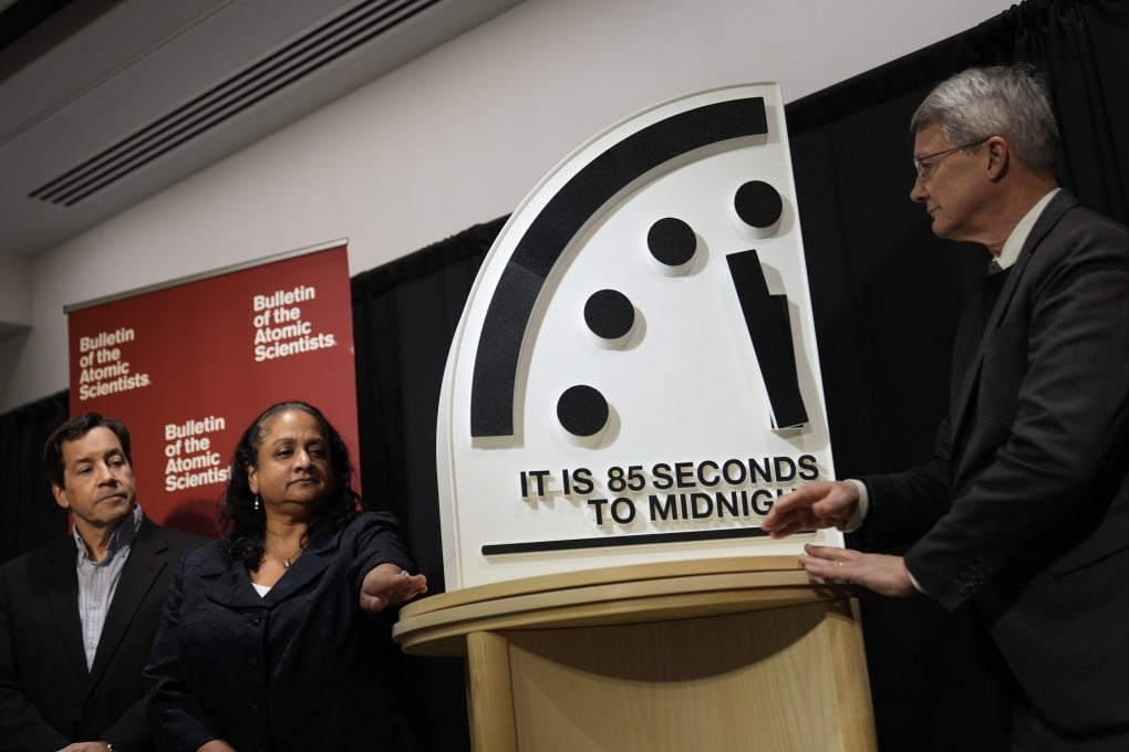 The Bulletin of the Atomic Scientists members (from left) Jon B. Wolfsthal, Asha M. George and Steve Fetter reveal the Doomsday Clock set to 85 seconds to midnight in Washington on Tuesday. Photo: AP