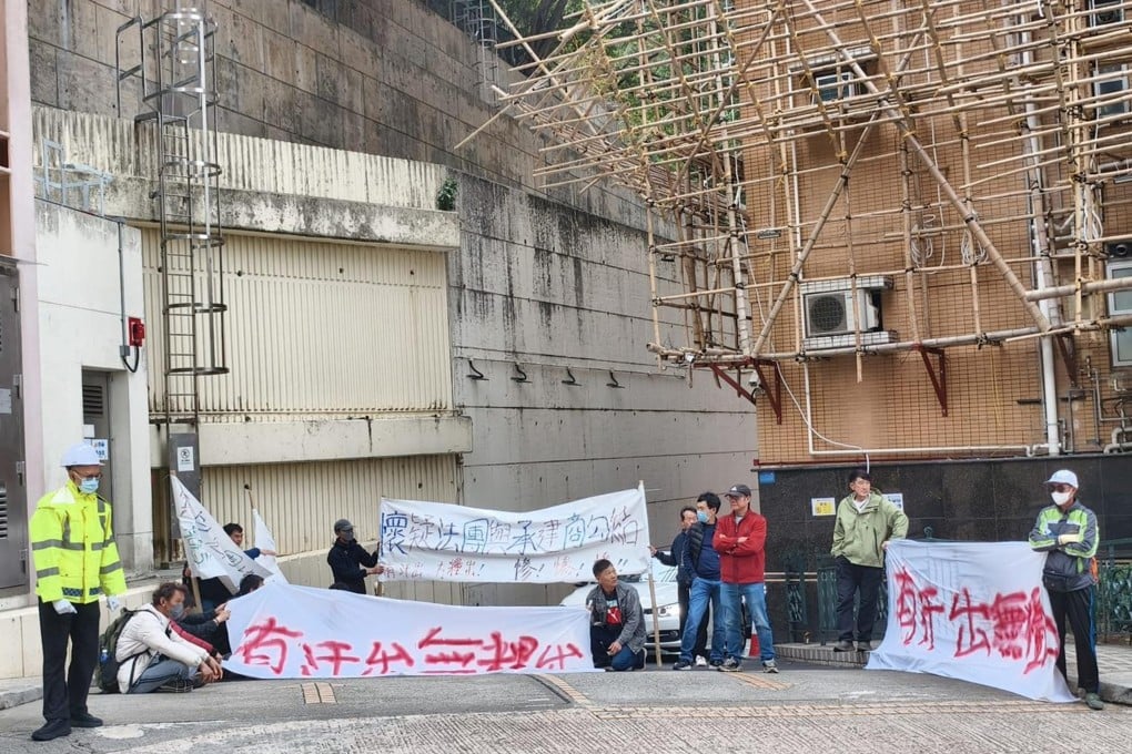 Construction workers stage a protest against Prestige Construction & Engineering Co Limited outside Baguio Villa in Pok Fu Lam on Wednesday. Photo: Handout