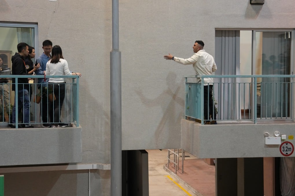 Trainees with the Police Negotiation Cadre practise negotiating with a man through an interpreter in 2023. Photo: Elson LI