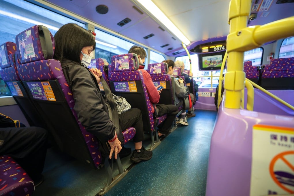 Passengers buckle up on a Hong Kong bus on January 26. Edmond So