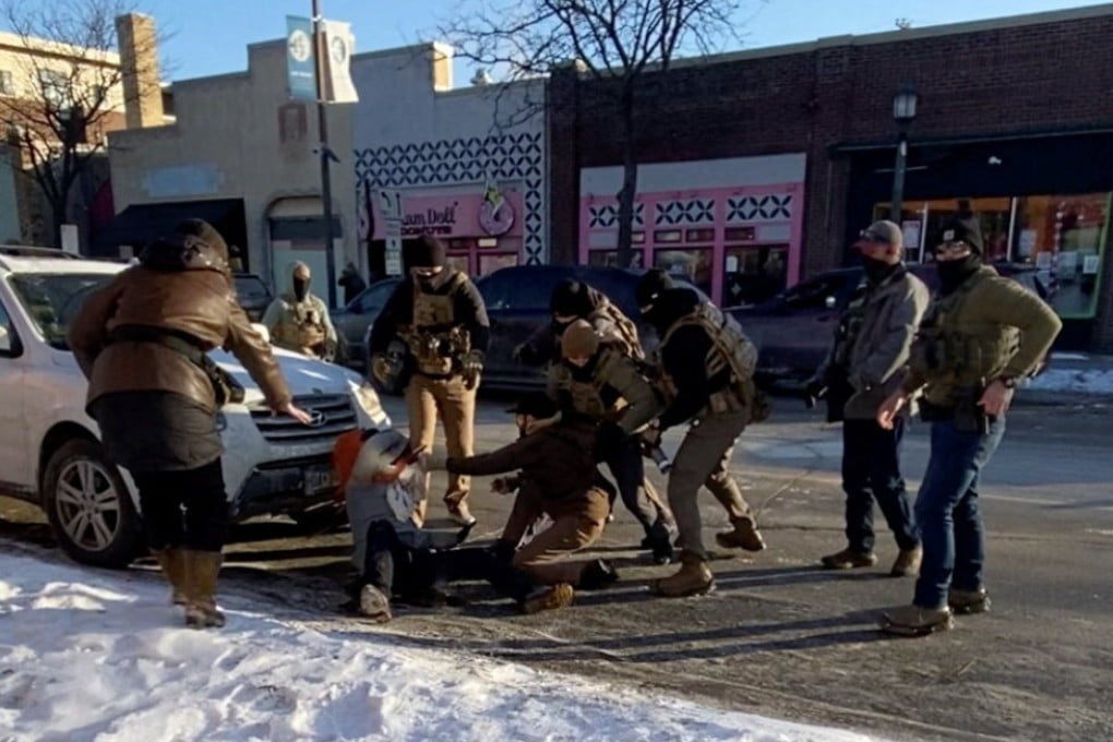 A screengrab from a video shows a law enforcement officer pinning down Alex Pretti, before he was fatally shot on January 24,. Photo: Reuters