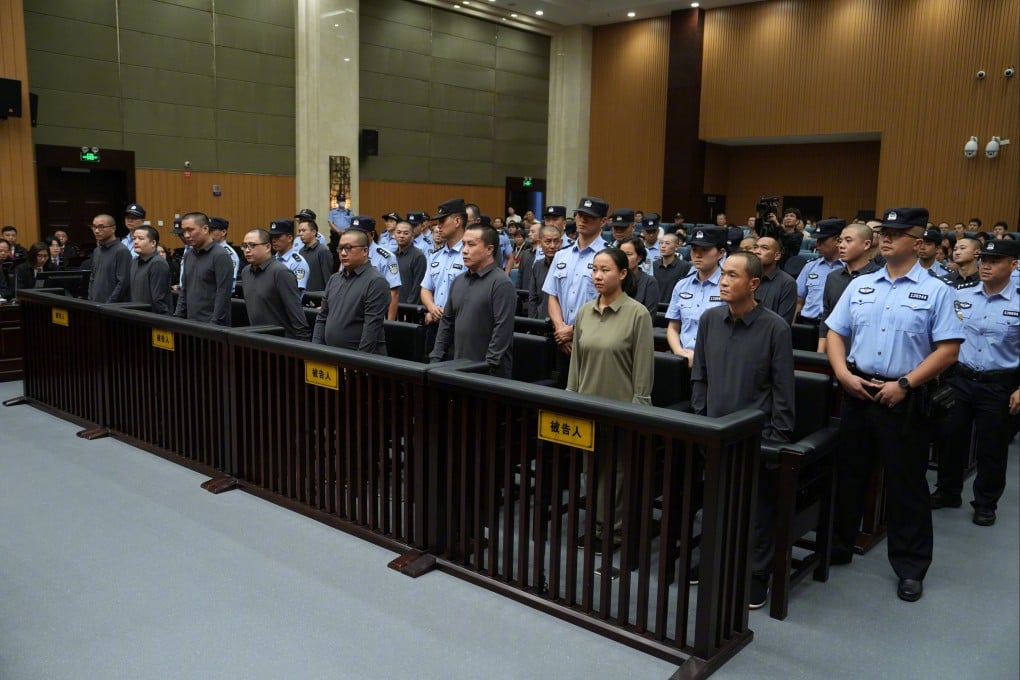 Members and associates of the Ming family crime ring attend a sentencing hearing at the Wenzhou Intermediate People’s Court in Zhejiang province, China on September 29.

Photo: CCTV