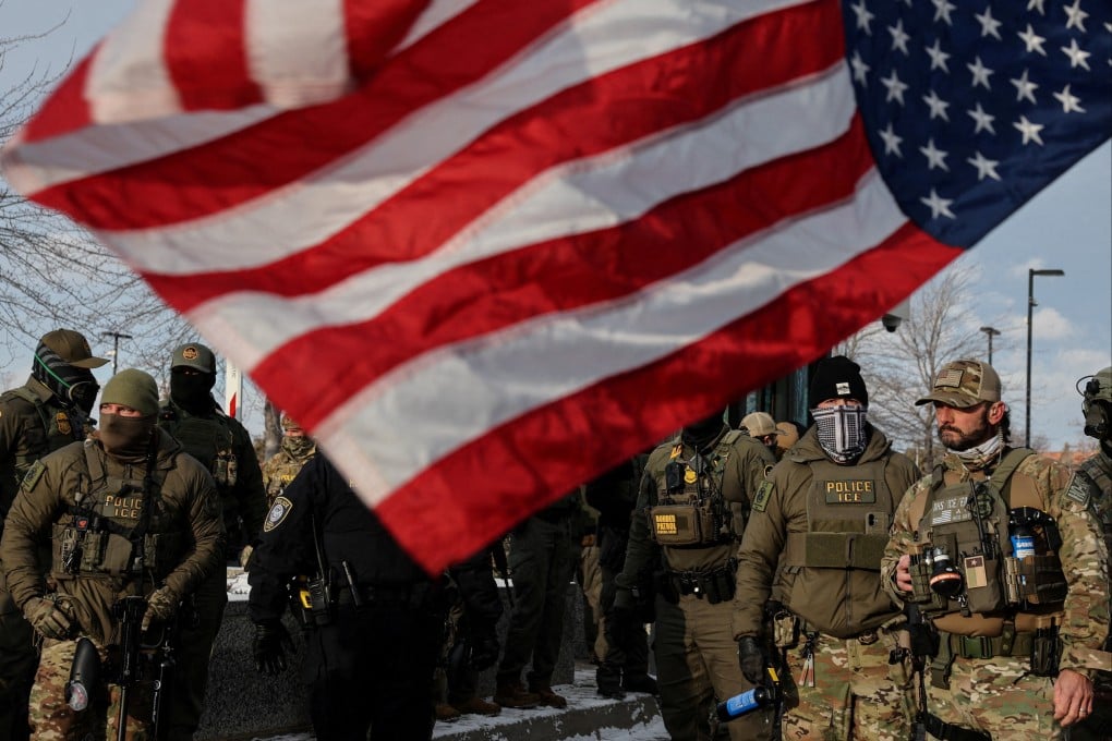 ICE agents guard outside the Bishop Henry Whipple Federal Building in Minneapolis, Minnesota. Photo: Reuters