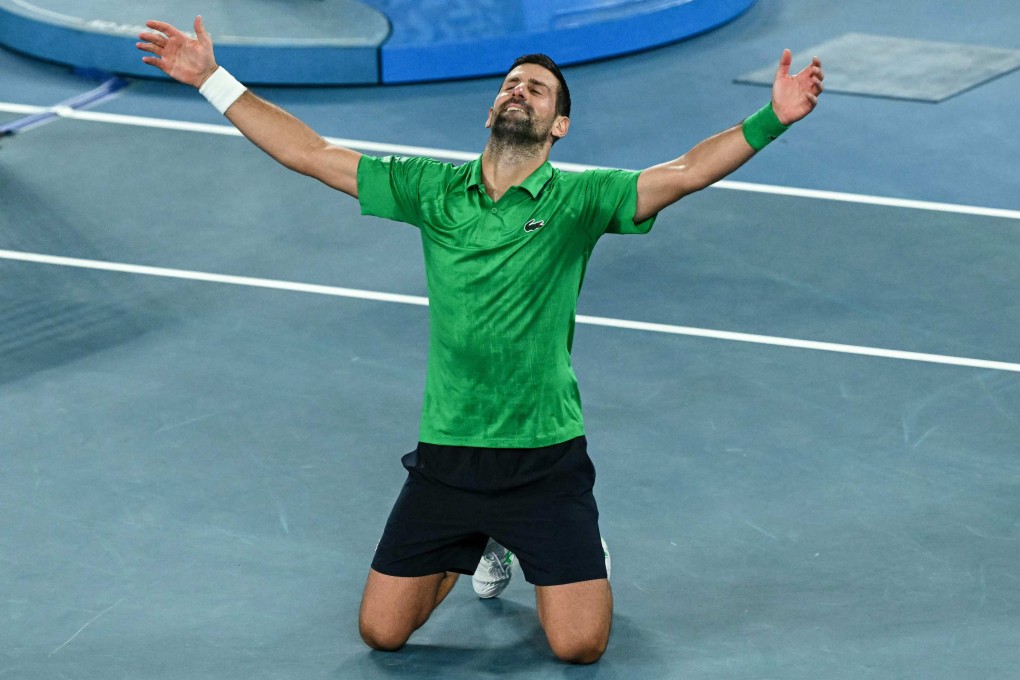 Novak Djokovic sinks to his knees after his marathon five-set win over Jannik Sinner in the men’s singles semi-final at the Australian Open. Photo: AFP