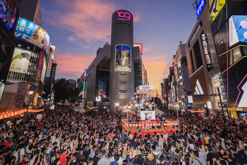 Locals and tourists alike crowd the streets of central Tokyo during a popular summer festival. Japan’s travel sector has so far coped well with a fall in Chinese tourism amid a diplomatic row over Taiwan. Photo: AFP