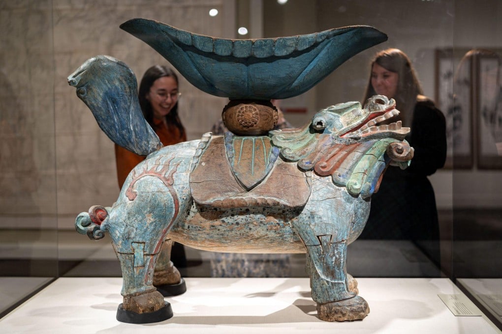Visitors admire a Joseon-era drum stand that’s part of the “Korean Treasures: Collected, Cherished, Shared” exhibition at the Smithsonian’s National Museum of Asian Art in Washington. The show features more than 200 works from the late Samsung chairman Lee Kun-hee’s vast collection. Photo: courtesy of Samsung Electronics