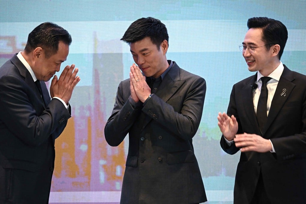 From left: Anutin Charnvirakul, Natthaphong Ruengpanyawut and Yodchanan Wongsawat during an event in Bangkok on January 12. The three are among prime ministerial candidates in Thailand’s coming election. Photo: AFP