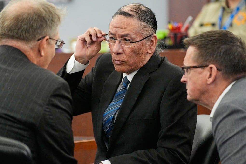 Nathan Chasing Horse (centre) speaks to his lawyers in court on January 20. Photo: AP