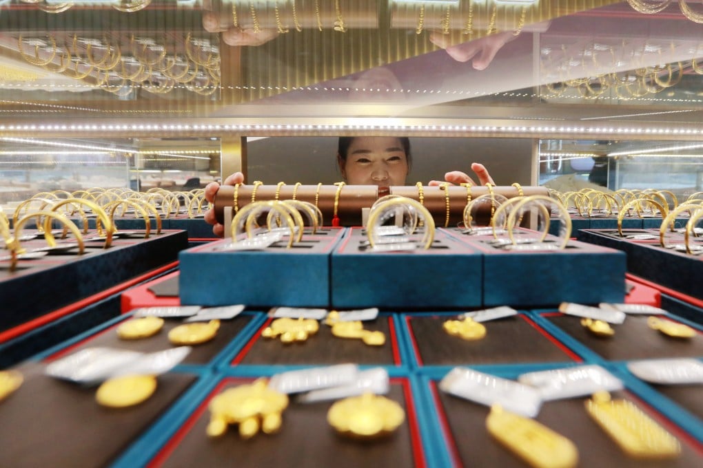 Many rich Chinese families aim to increase their gold holdings this year as risk appetite continues to contract. Photo: Xinhua