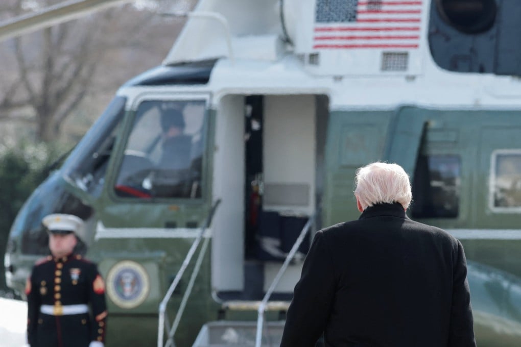 US President Donald Trump walks towards the Marine One to travel to Iowa from the White House on January 27. Photo: Reuters