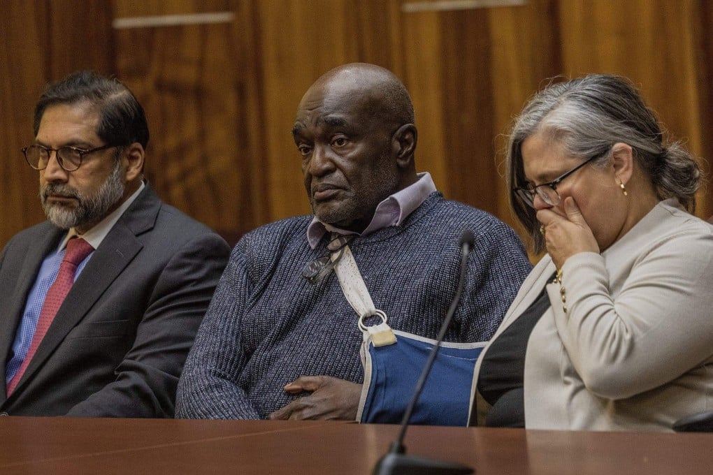 Harrel Braddy, flanked by his lawyers, reacts as he is sentenced to life in prison in Miami, Florida, on Friday. Photo: TNS