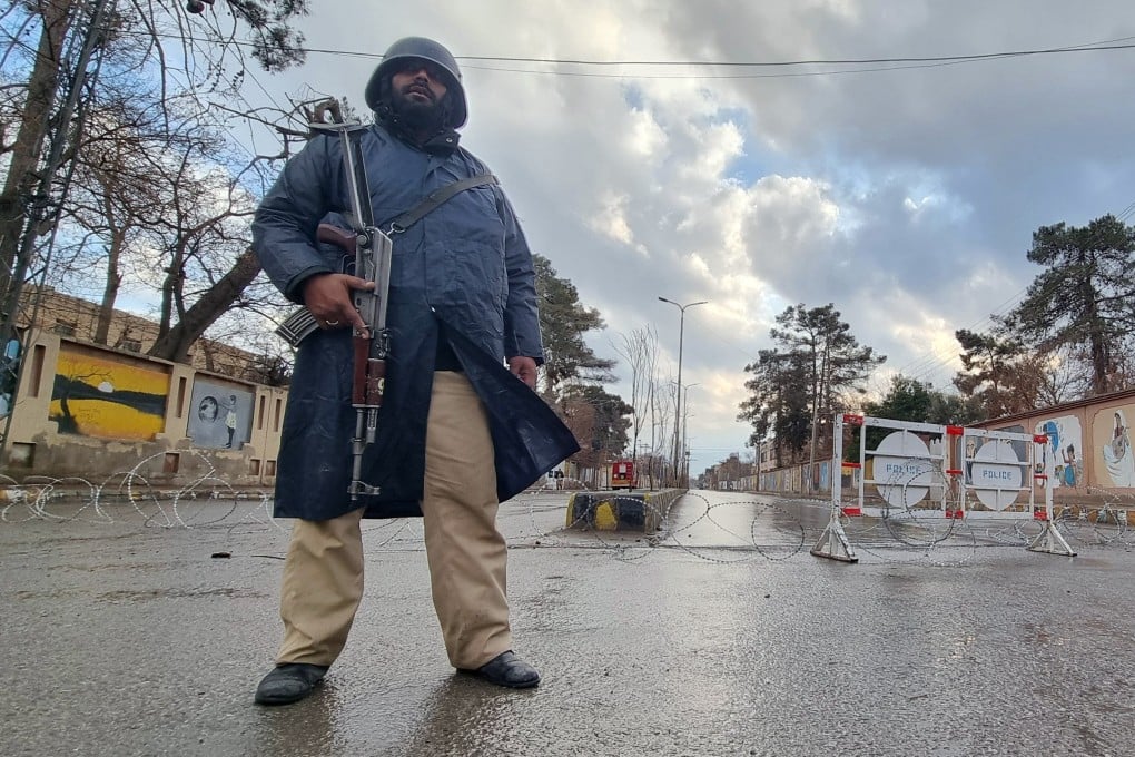 Pakistani security officials stand guard on a road after militants launched coordinated attacks across Balochistan province, in Quetta, Pakistan on Saturday. Photo: EPA-EFE