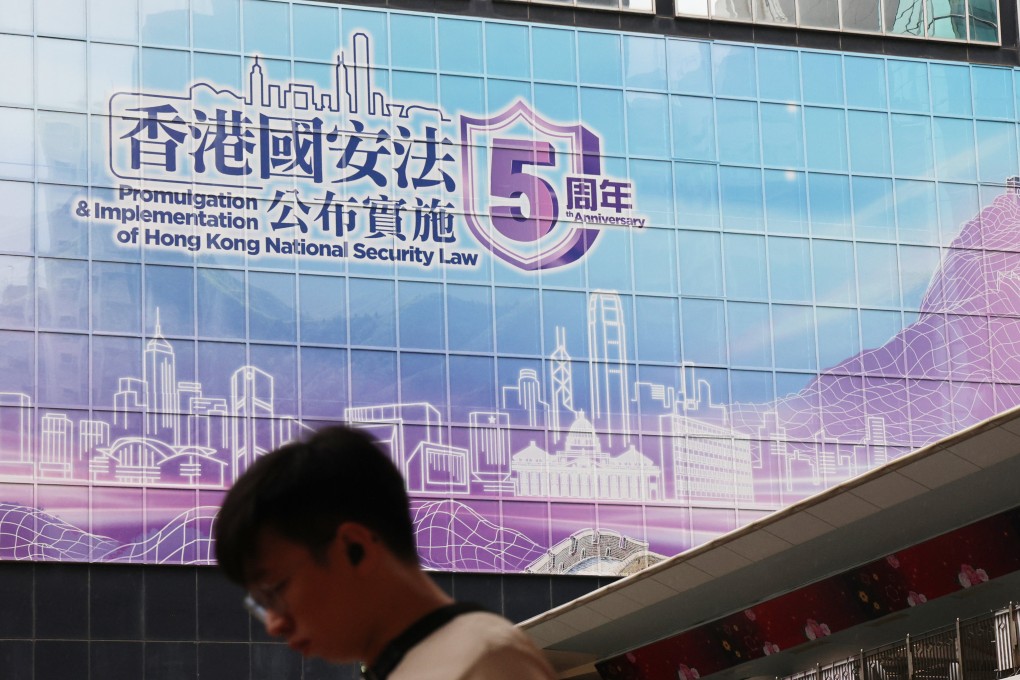 A poster in Wan Chai commemorating the fifth anniversary of the 2020 national security law. Photo: Jelly Tse