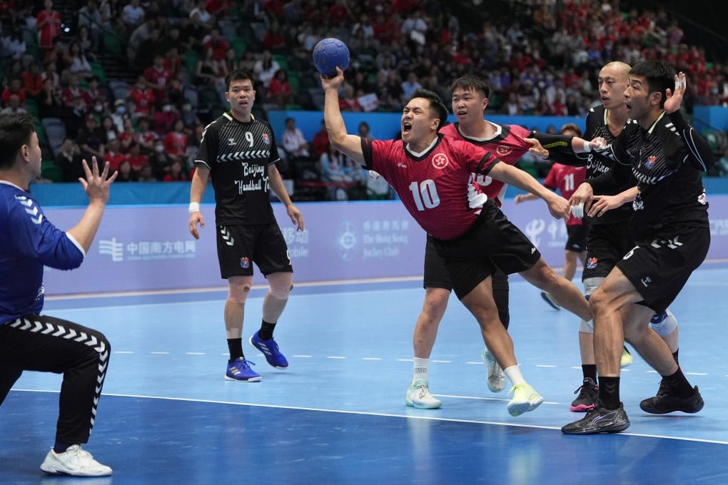 Freddie Tse (centre) believes the Hong Kong handball team’s recent run of results has increased recognition of the sport in the city. Photo: Eugene Lee