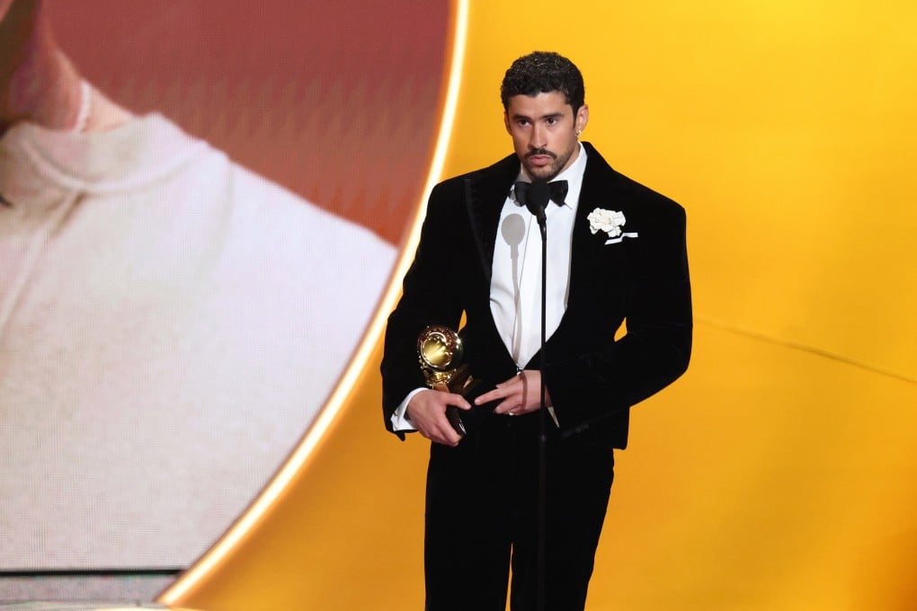 Bad Bunny accepts the album of the year award for Debí Tirar Más Fotos at the 68th annual Grammy Awards in Los Angeles, California. Photo: TNS