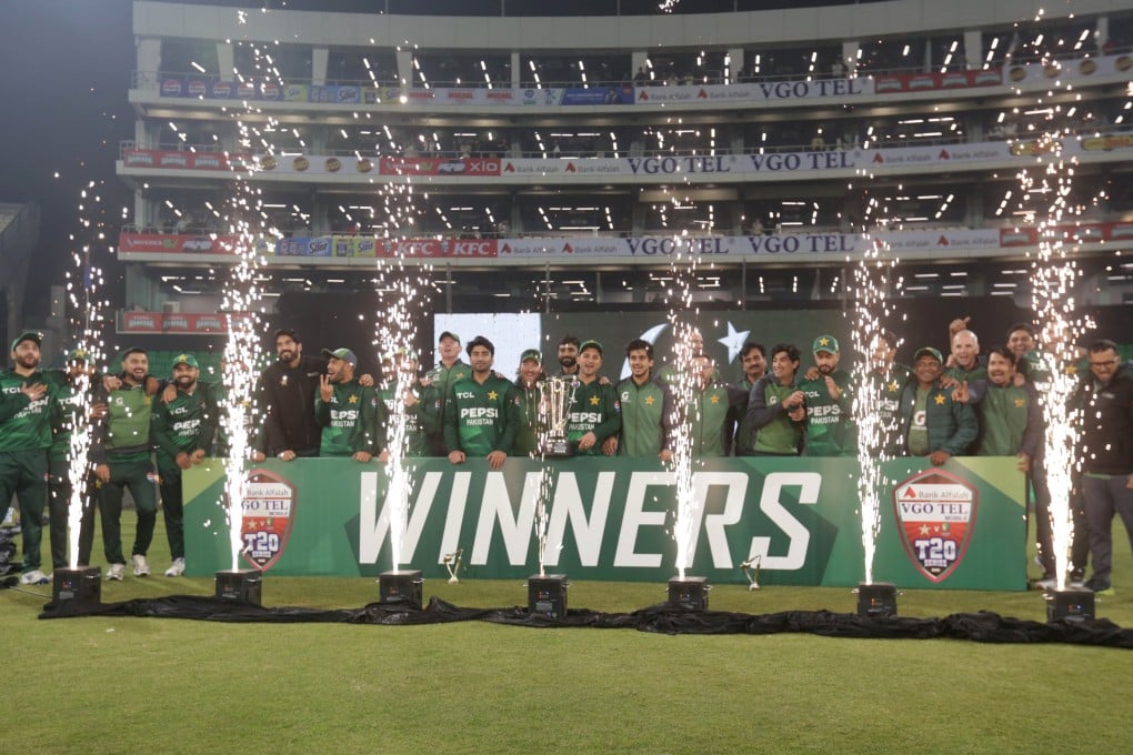 Pakistani players celebrate winning the series and the third T20 international cricket match between Pakistan and Australia in Lahore on Sunday. Photo: EPA