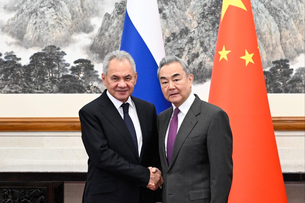 Wang Yi and Sergei Shoigu, pictured in Beijing on Sunday. Photo: Xinhua