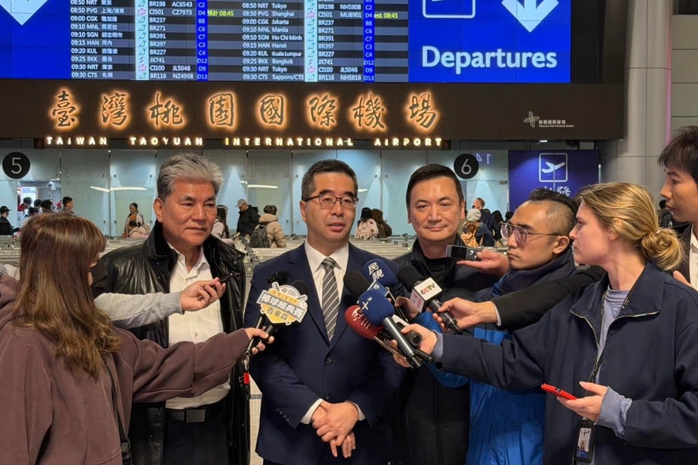 KMT vice-chairman Hsiao Hsu-tsen (centre) speaks to reporters at the airport in Taiwan on Monday before leaving for Beijing. Photo: Handout