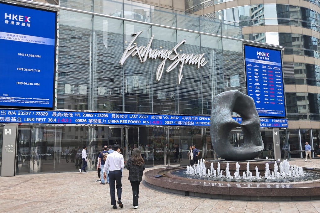 People walk past Exchange Square in Central, home of bourse operator Hong Kong Exchanges and Clearing, on March 28, 2025. Photo: Matthew Miller