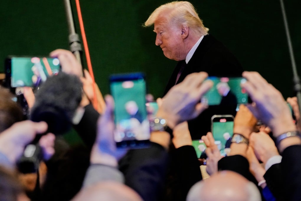 US President Donald Trump is photographed by a gaggle of journalists at the World Economic Forum annual meeting in Davos, Switzerland, on January 22. Photo: AP