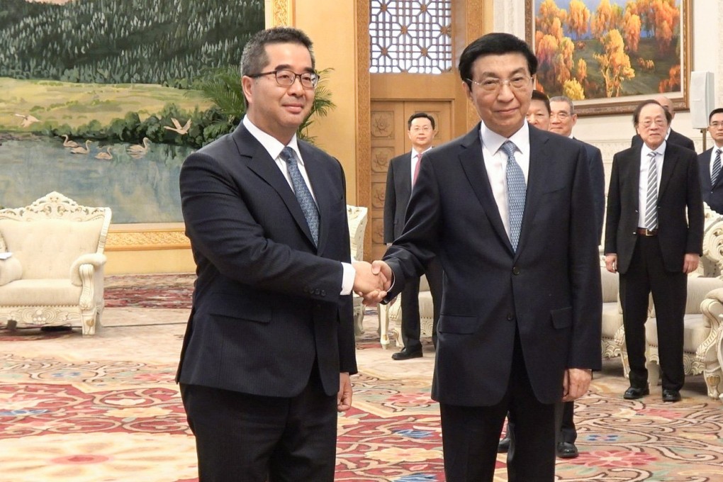 KMT vice-chairman Hsiao Hsu-tsen (left) meets Wang Huning (right), mainland China’s top Taiwan affairs official, on Wednesday in Beijing. Photo: CNA