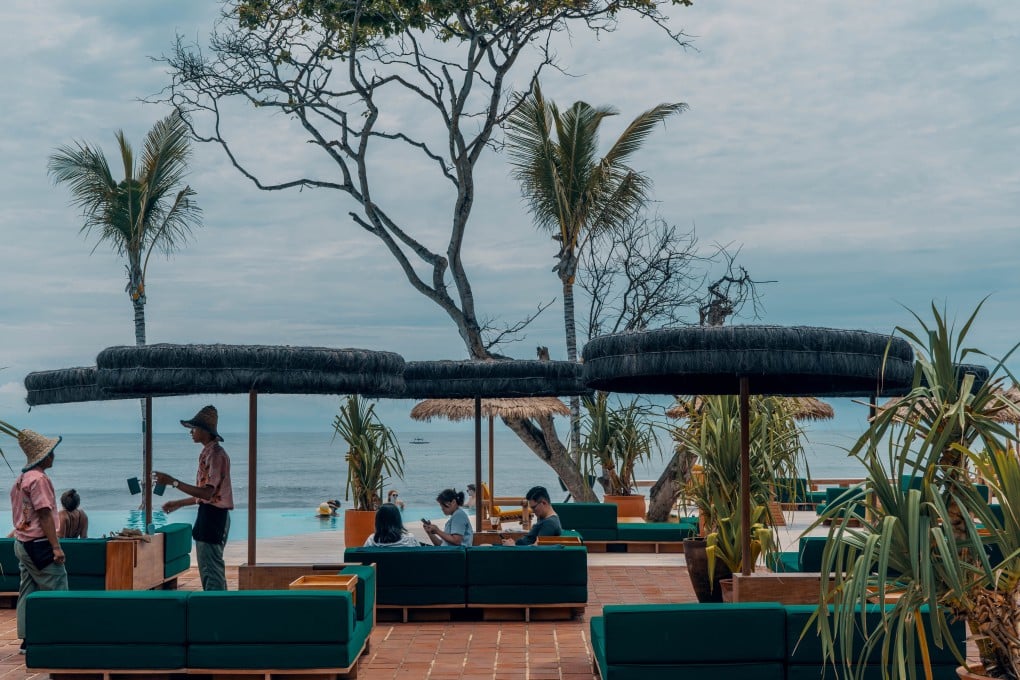 Guests relax in the pool area at Desa Potato Head, a resort in Bali with wellness, dining and creative workshops that has been lauded for its sustainability efforts. Photo: Desa Potato Head
