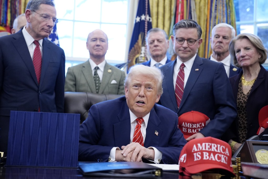 US President Donald Trump (centre) takes part in a bill signing ceremony in the Oval Office on Tuesday. Photo: EPA