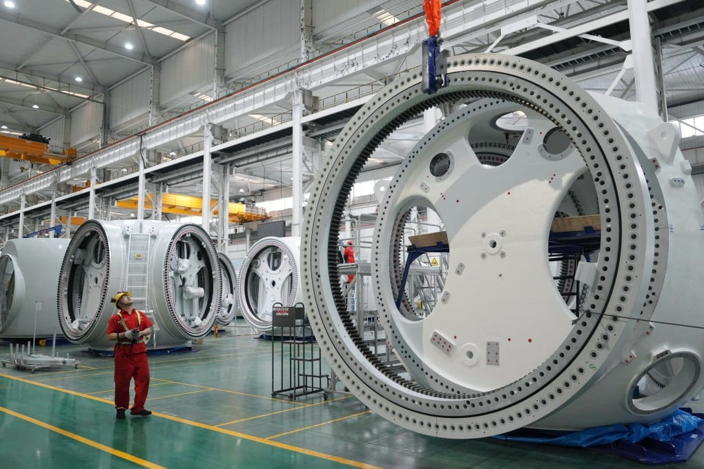 A worker inspects parts at Goldwind Science & Technology’s wind turbine factory in China’s eastern Jiangsu province. Photo: Xinhua