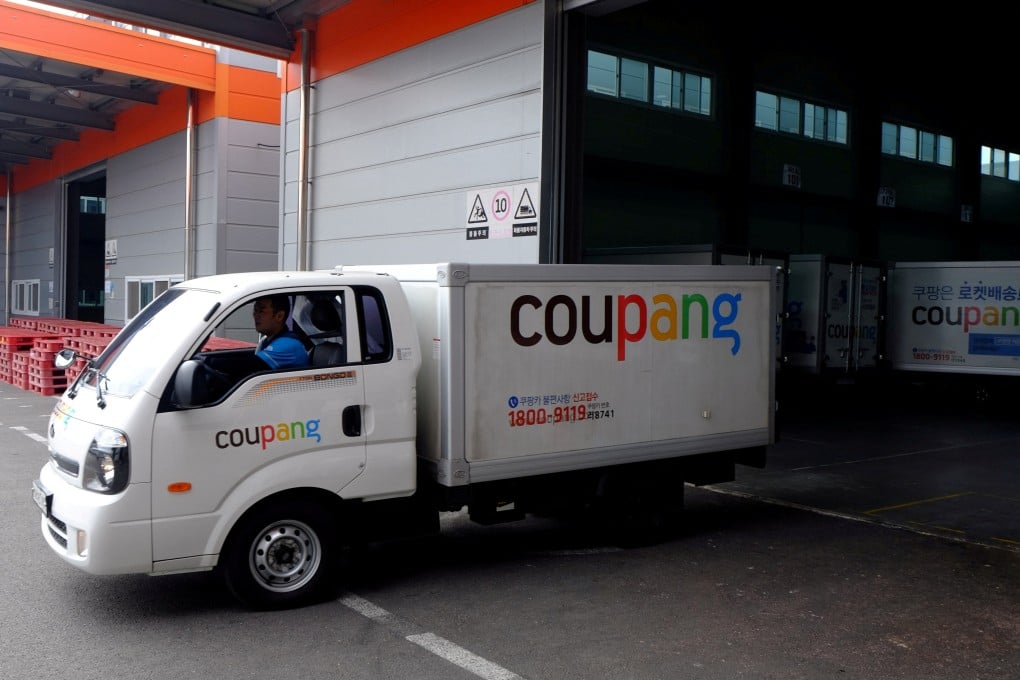 Delivery trucks for e-commerce retailer Coupang leave a distribution centre in Seoul, South Korea. Coupang’s data leak last year exposed the personal information of 33.7 million people. Photo: Reuters