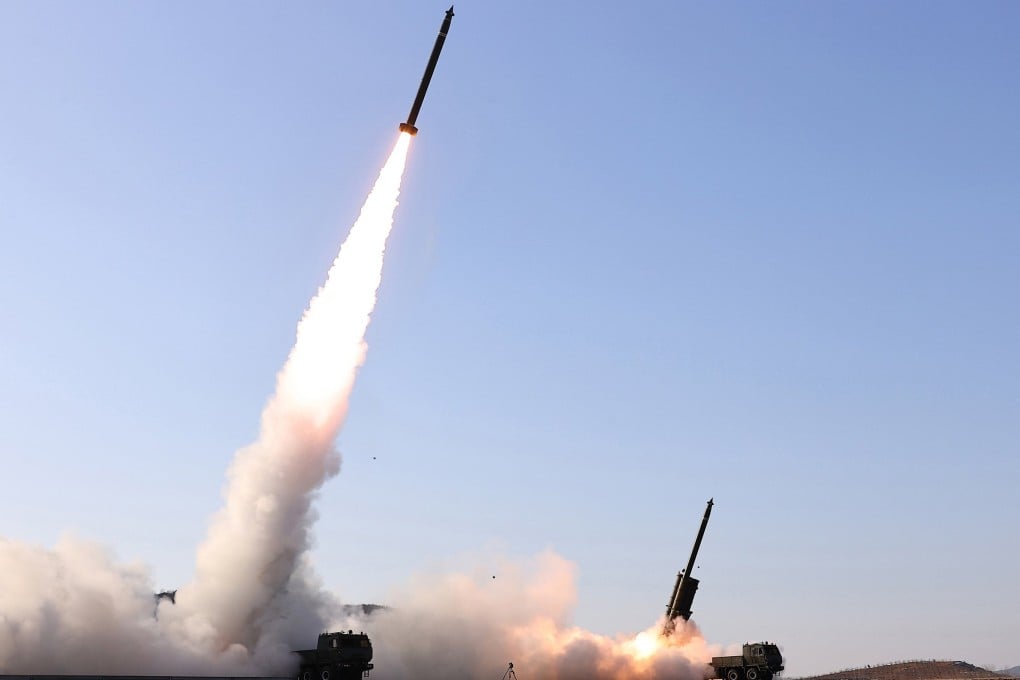 A test-fire of a large-calibre multiple-rocket launcher system at an unknown location in North Korea on January 27. Photo: EPA/KCNA