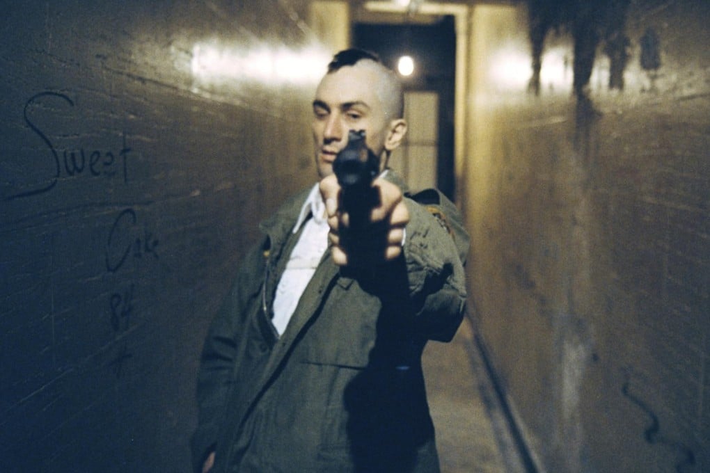 Robert De Niro in a scene in Martin Scorsese’s Taxi Driver. We take a deep dive into the film’s cultural impact, De Niro’s role, and its chilling relevance today. Photo: Columbia/TriStar