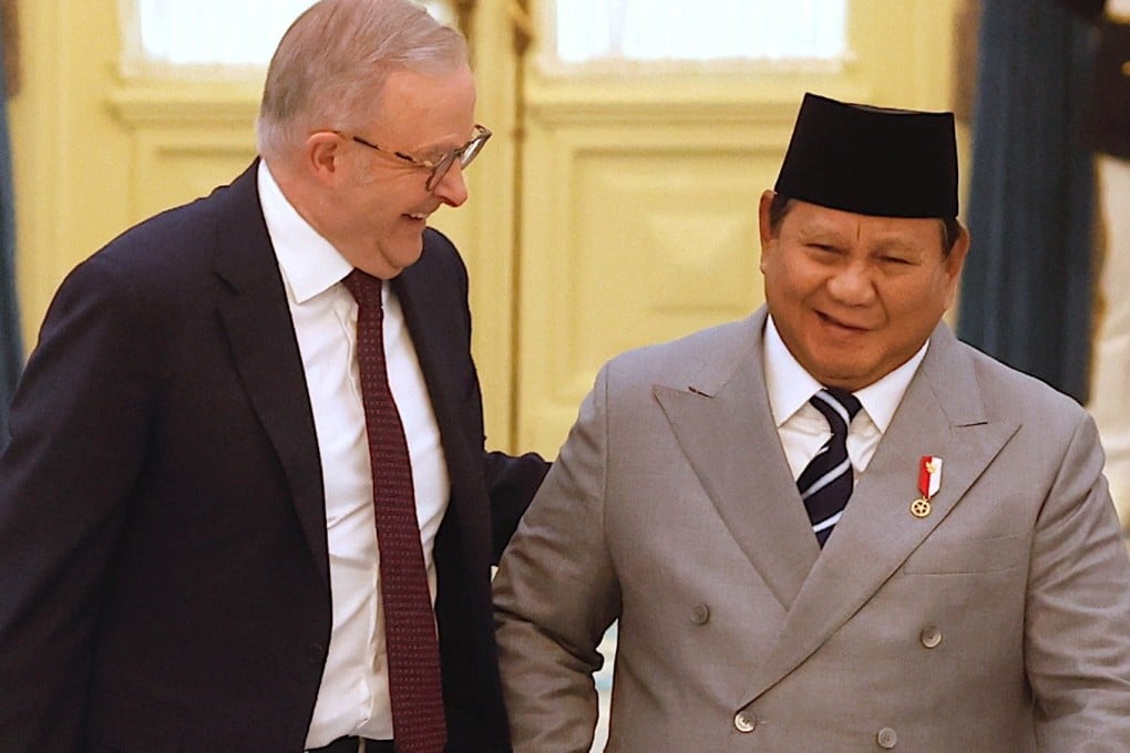 Australia’s Prime Minister Anthony Albanese (left) chats with Indonesia’s President Prabowo Subianto as they walk to their meeting at Merdeka Palace in Jakarta on Friday. Photo: EPA