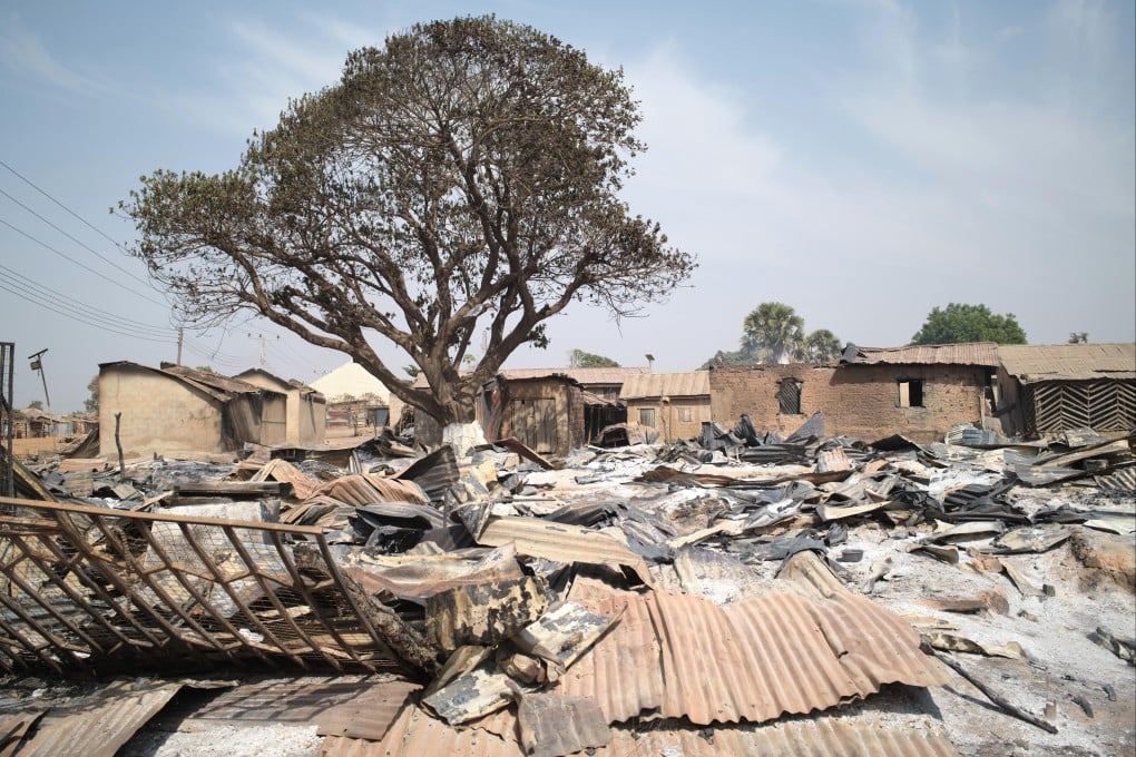 Razed homes in the Muslim-majority village of Woro, Nigeria. Photo: AP