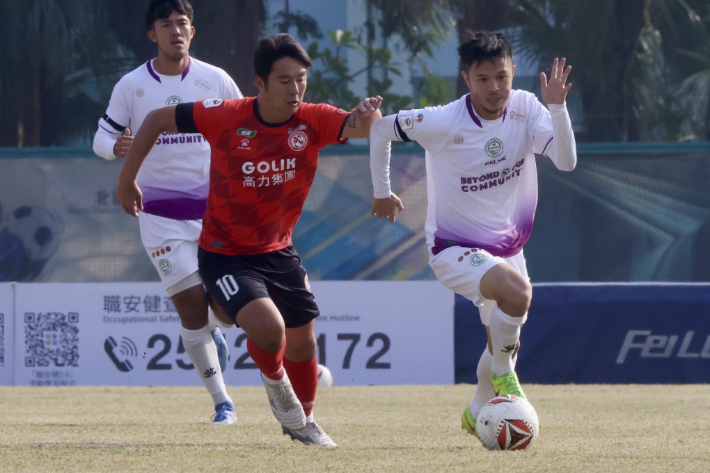 Philip Chan, right, tries to sprint clear of Law Hiu-chung in Tai Po’s 1-1 league draw at North District. Photo: Jonathan Wong