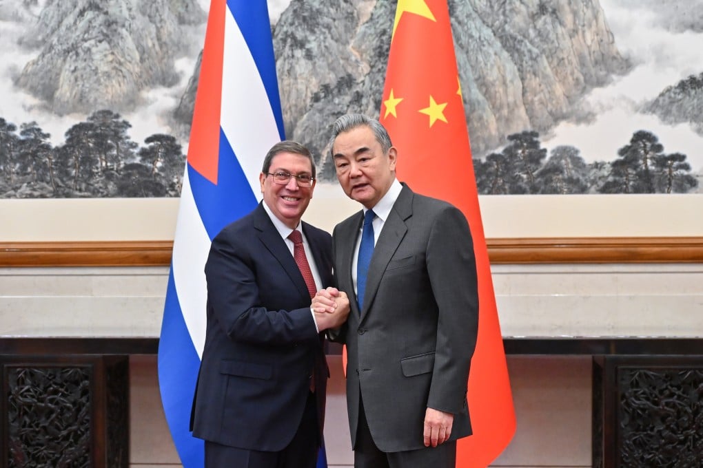Cuban Foreign Minister Bruno Rodriguez Parrilla (left) and Chinese Foreign Minister Wang Yi reaffirm their countries’ ties in Beijing on Thursday. Photo: Xinhua