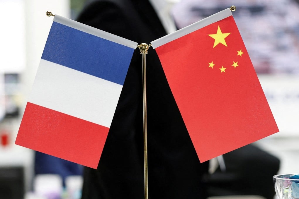 The flags of France and China. On Thursday, two Chinese nationals were placed under formal investigation in France. Photo: Reuters
