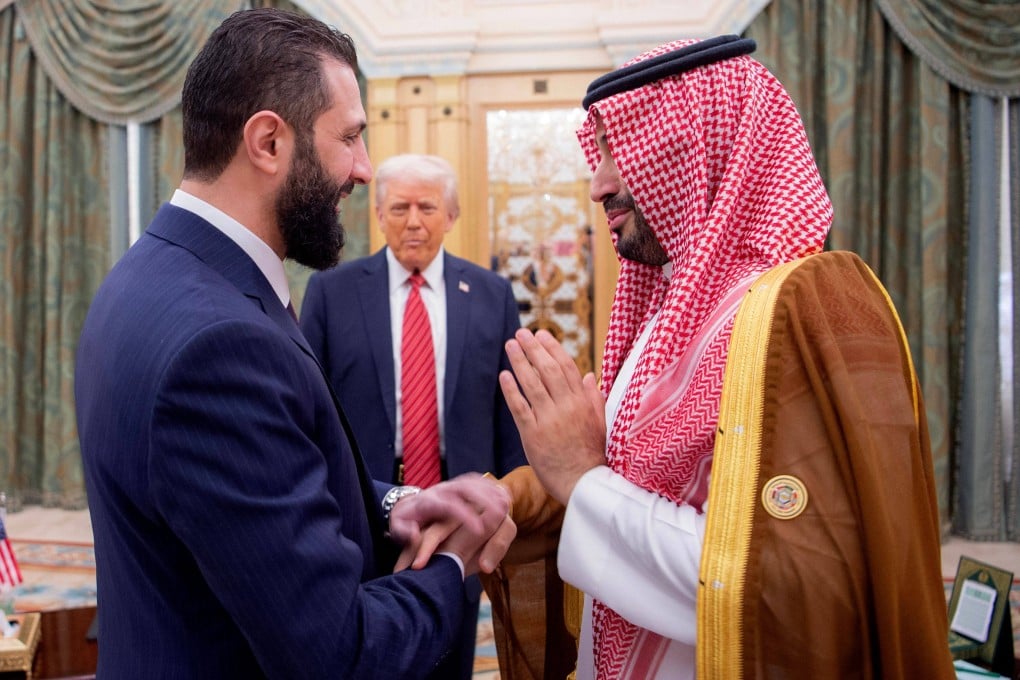 A handout picture provided by the Saudi Royal Palace shows Saudi Crown Prince Mohammed bin Salman (right) greeting Syria’s interim president Ahmed al-Sharaa as US President Donald Trump looks on, in Riyadh on May 14 last year. Photo: AFP