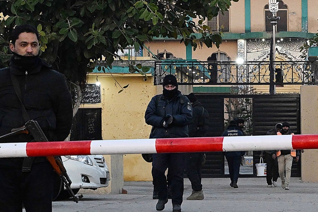 Police investigate the scene of Friday’s suicide bombing at a Shiite mosque in Islamabad on Saturday. Photo: AFP