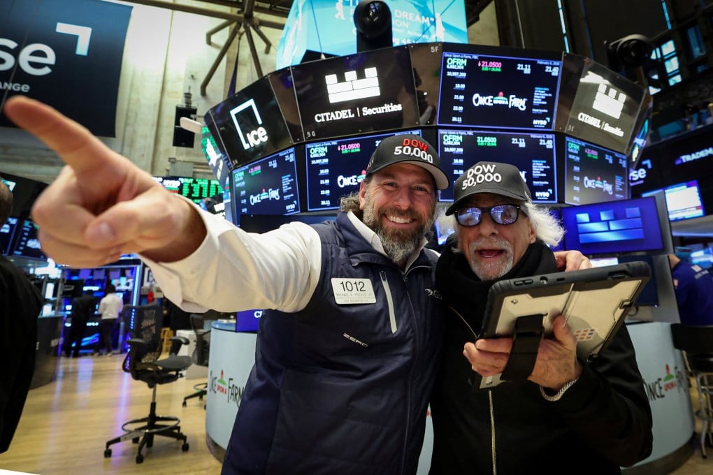 Traders react after the closing bell as the Dow Jones Industrial Average surpasses the 50,000 mark in New York on Friday. Photo: Reuters
