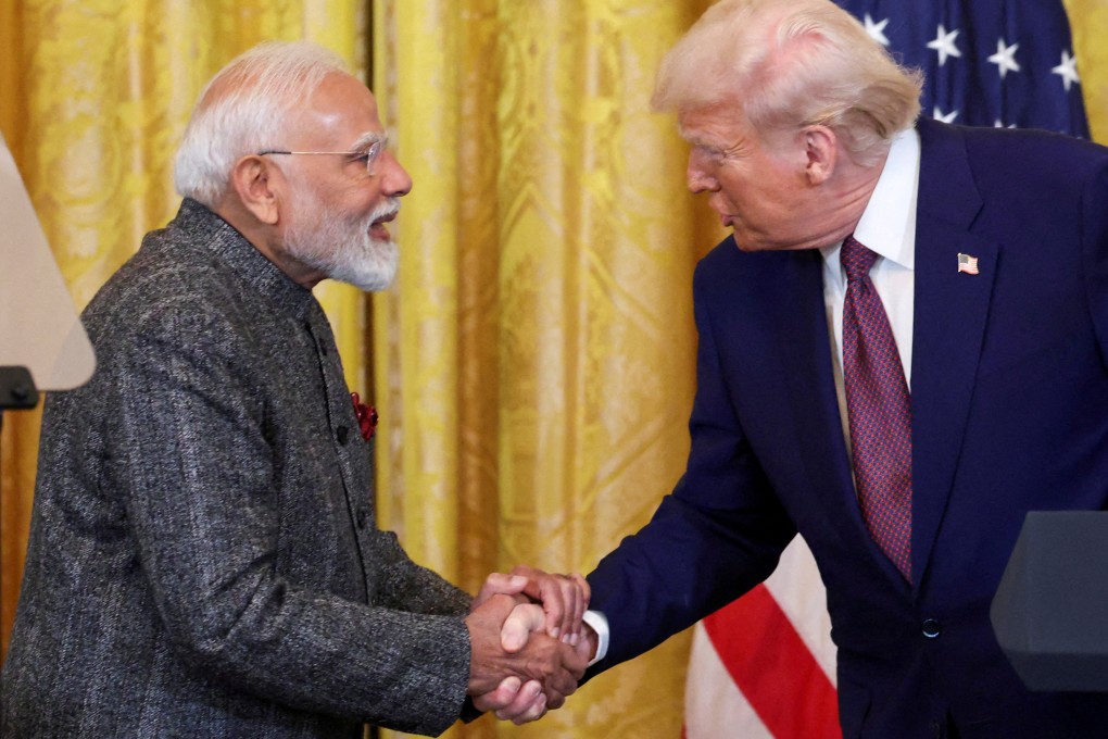 US President Donald Trump (right) and Indian Prime Minister Narendra Modi shake hands after a joint press conference at the White House on February 13, 2025. Photo: Reuters