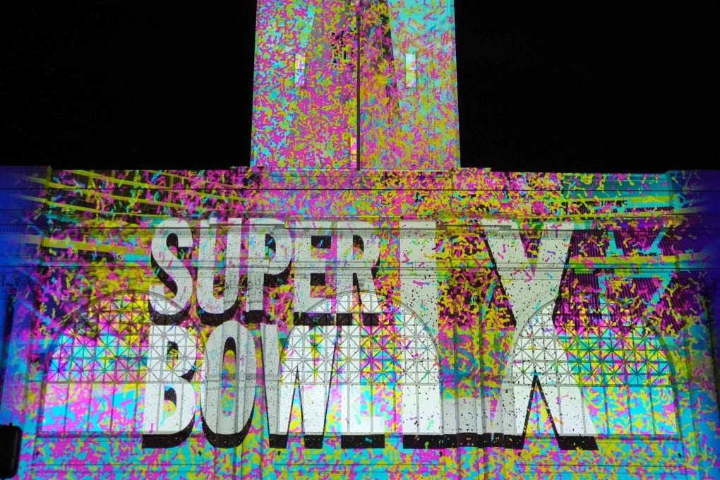 The Super Bowl LX logo being projected on the Ferry Building in San Francisco, on Friday. Photo: Kirby Lee-Imagn Images
