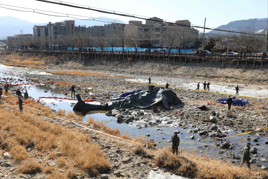 The crash site of the AH-1S Cobra helicopter. Photo: Yonhap via AFP