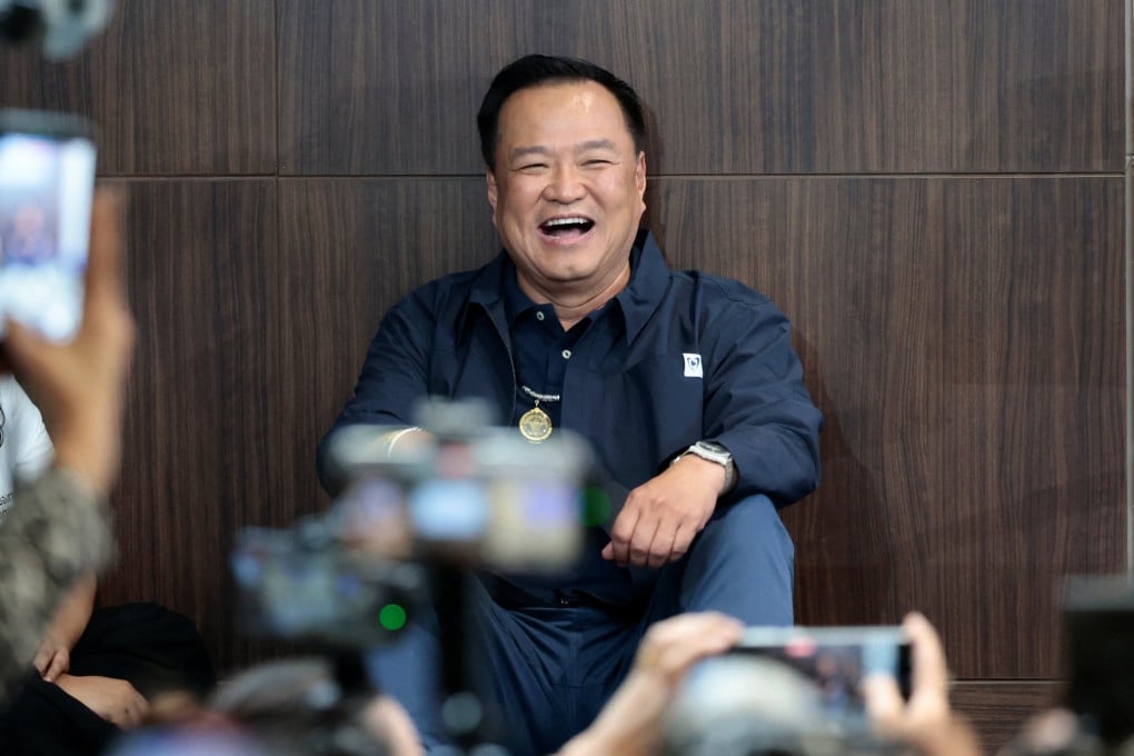 Thailand’s caretaker PM, Anutin Charnvirakul, reacts on Sunday in Bangkok as his party takes the lead. Photo: Reuters